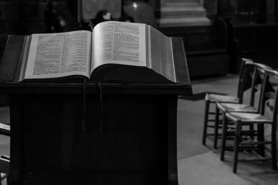 a holy book on wooden church pulpit